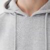 Soft charcoal grey hoodie with custom front pocket and durable stitching