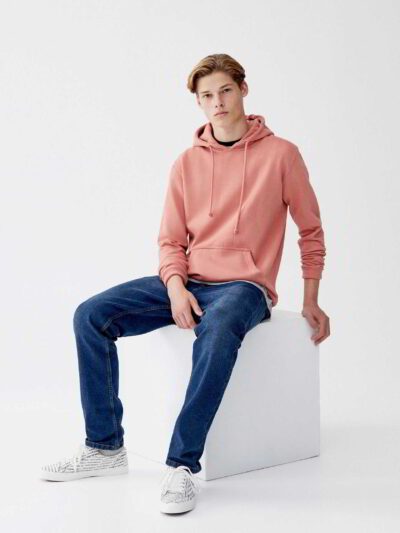 Soft grey cotton hoodie with convenient front pouch pocket and durable stitching