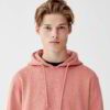 Soft grey pouch hoodie with ribbed hem and cuffs, made of premium cotton blend fabric