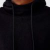 Black and white hoodie with side stripes, made of premium cotton blend, ribbed cuffs, and kangaroo pocket