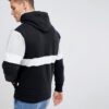 Vintage-style black pullover hoodie with half zipper, showcasing retro design elements and durable stitching