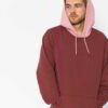 Soft fleece contrast hoodie in black and white with ribbed accents and kangaroo pocket