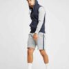 Navy blue embroidered hoodie with intricate stitch patterns and cozy fleece interior