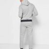 Deep navy custom embroidered tracksuits with white detailing, showcasing premium stitching, soft velvety texture and snug fit