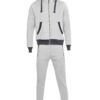 Deep navy custom embroidered tracksuits with white detailing, showcasing premium stitching, soft velvety texture and snug fit