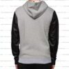 Sleek grey hoodie with edgy PU leather sleeves, tailored stitching, and modern design