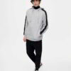 High-quality, striped logo hoodies in various colors, exhibiting meticulous stitching and soft, plush fabric texture.