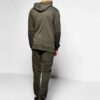 Ribbed biker tracksuit in soft cotton. Close-up shows textured fabric, reinforced stitching, and customizable panels. Premium