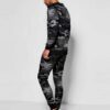 Green camo tracksuit: soft, brushed fabric, neat stitching. Relaxed fit hoodie and joggers. Modern streetwear for clothing br