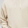 Half white pullover hoodie with custom blank design, showcasing soft fabric texture and intricate stitching details