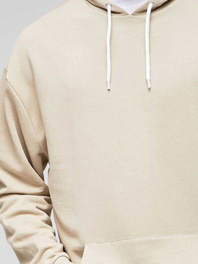 Half white pullover hoodie with custom blank design, showcasing soft fabric texture and intricate stitching details