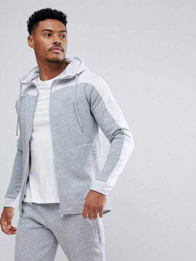 Heavyweight black cotton hoodie with front kangaroo pocket and ribbed cuffs