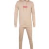 Skinny tracksuit set showing fine stitching. Close-up reveals a soft, textured knit fabric in a subtle heather gray with slim