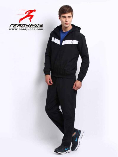 Stylish streetwear tracksuit, close-up shows durable stitching, ribbed cuffs, and soft fabric texture. Two-piece set with sub