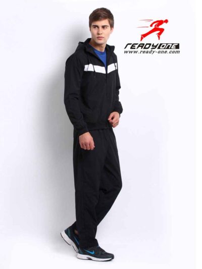 Stylish streetwear tracksuit, close-up shows durable stitching, ribbed cuffs, and soft fabric texture. Two-piece set with sub