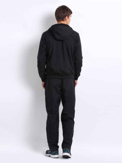 Stylish streetwear tracksuit, close-up shows durable stitching, ribbed cuffs, and soft fabric texture. Two-piece set with sub