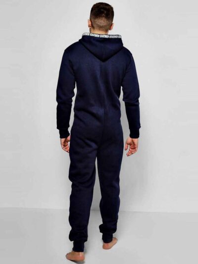 Close-up: Printed hooded onesie, high GSM fabric with visible textured weave. Detailed stitching, soft pastel tones, bulk man