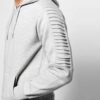 Ribbed knit tracksuit in charcoal gray. Streetwear style, paneled design, athletic fit. Notice the distinct ribbing texture a