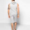 Sleeveless hooded tracksuit, close-up on soft knit fabric, detailed stitching. Activewear set in gradient blues, ideal for gy