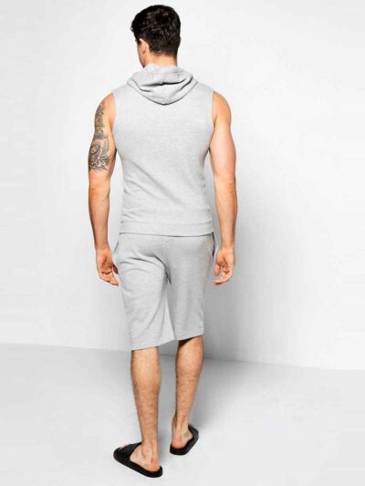 Sleeveless hooded tracksuit, close-up on soft knit fabric, detailed stitching. Activewear set in gradient blues, ideal for gy