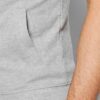 Sleeveless hooded tracksuit, close-up on soft knit fabric, detailed stitching. Activewear set in gradient blues, ideal for gy