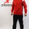 High-end jogging tracksuit. Close-up shows smooth fabric, likely double-knit. Fine stitching detail. Light gray with subtle d