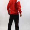 High-end jogging tracksuit. Close-up shows smooth fabric, likely double-knit. Fine stitching detail. Light gray with subtle d
