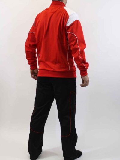 High-end jogging tracksuit. Close-up shows smooth fabric, likely double-knit. Fine stitching detail. Light gray with subtle d