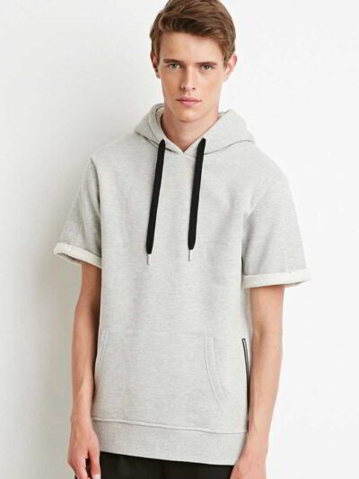 Elevated streetwear hoodie in a short sleeve design features contrasting stitches and soft-textured fabric