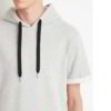 Urban short-sleeved hoodie in contemporary design, showcasing fine stitching, soft touch, and a distinctive streetwear vibe.