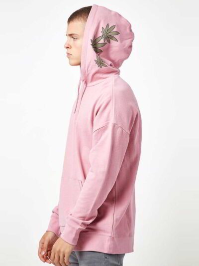 Light pink oversized hoodie with drop shoulder design. Soft cotton blend fabric, high-quality stitching, perfect for a laid-b
