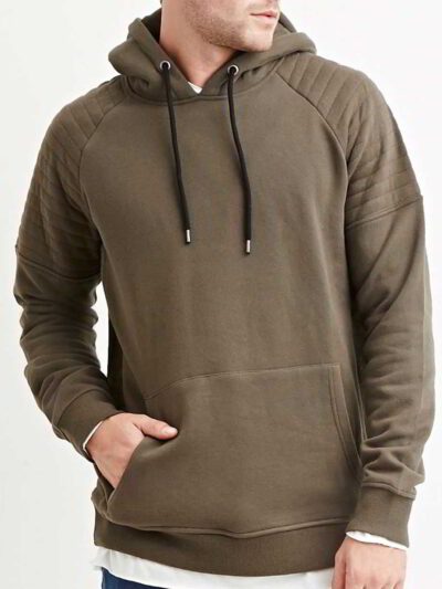 Close-up of a textured charcoal grey biker hoodie. Heavy stitching, oversized hood, and comfortable pullover style visible. Q