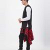 Sleeveless black hoodie. Close-up shows textured fabric, durable stitching. Custom cut & sew design. Athletic, modern menswea
