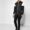 Custom tracksuit showcasing panel design. Soft, brushed fabric, neat stitching. Contrasting colors highlight the modern silho