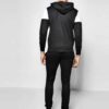 Custom tracksuit showcasing panel design. Soft, brushed fabric, neat stitching. Contrasting colors highlight the modern silho