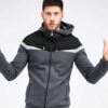 Soft heather gray hoodie with front pouch pocket and ribbed hem, ideal for casual wear
