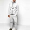Luxe tracksuits in bulk: soft fleece, durable stitching. Unisex fit, available in various colors. Ribbed cuffs & waistband, c