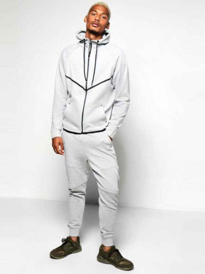 Luxe tracksuits in bulk: soft fleece, durable stitching. Unisex fit, available in various colors. Ribbed cuffs & waistband, c