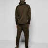 Luxe tracksuits in bulk: soft fleece, durable stitching. Unisex fit, available in various colors. Ribbed cuffs & waistband, c