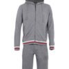 Sporty short tracksuit in bulk production. Ribbed knit trim, contrasting side stripes, close-up showing smooth, durable fabri