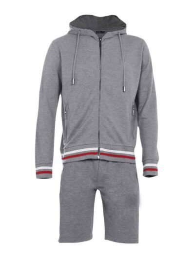 Sporty short tracksuit in bulk production. Ribbed knit trim, contrasting side stripes, close-up showing smooth, durable fabri
