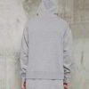 Double he custom longline hoodie in heavyweight black cotton with ribbed cuffs and front kangaroo pocket