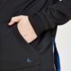 Close-up: Premium cotton pullover hoodie. Soft knit texture, visible stitching details. Hints of heathered gray and deep navy