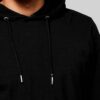 Slim athletic tracksuit. Close-up shows fine stitching, smooth fabric texture; hints of deep blues and charcoal grey. Streaml