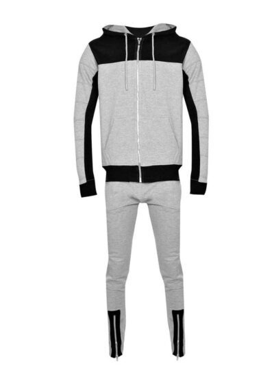 Skinny fit jogging tracksuit: panel design, custom cut and sew. Noticeable fabric texture, detailed stitching, athletic wear.