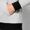 Skinny fit jogging tracksuit: panel design, custom cut and sew. Noticeable fabric texture, detailed stitching, athletic wear.