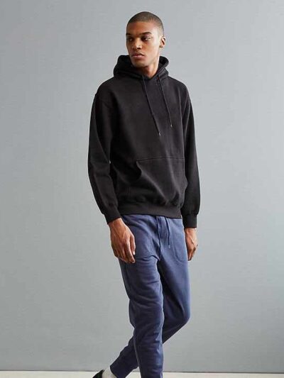 Soft black hoodie with kangaroo pocket and ribbed cuffs in heavyweight cotton fabric