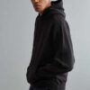 Soft black hoodie with front pocket and ribbed cuffs, made from sustainable fabric