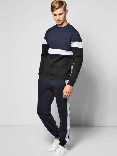 Panelled sweatshirt and tracksuit bottoms. Heavy-knit fleece texture. Detailed stitching, custom production example. Charcoal