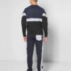 Panelled sweatshirt and tracksuit bottoms. Heavy-knit fleece texture. Detailed stitching, custom production example. Charcoal